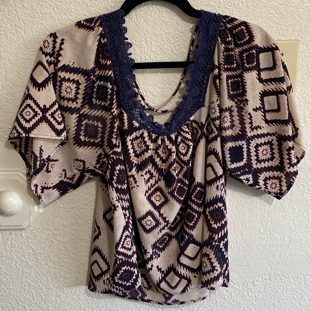 Blouse with crossover back
